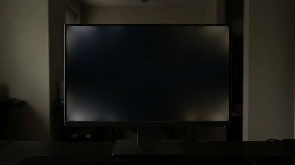 Monitor con fuga de luz en las esquinas sobre fondo negro